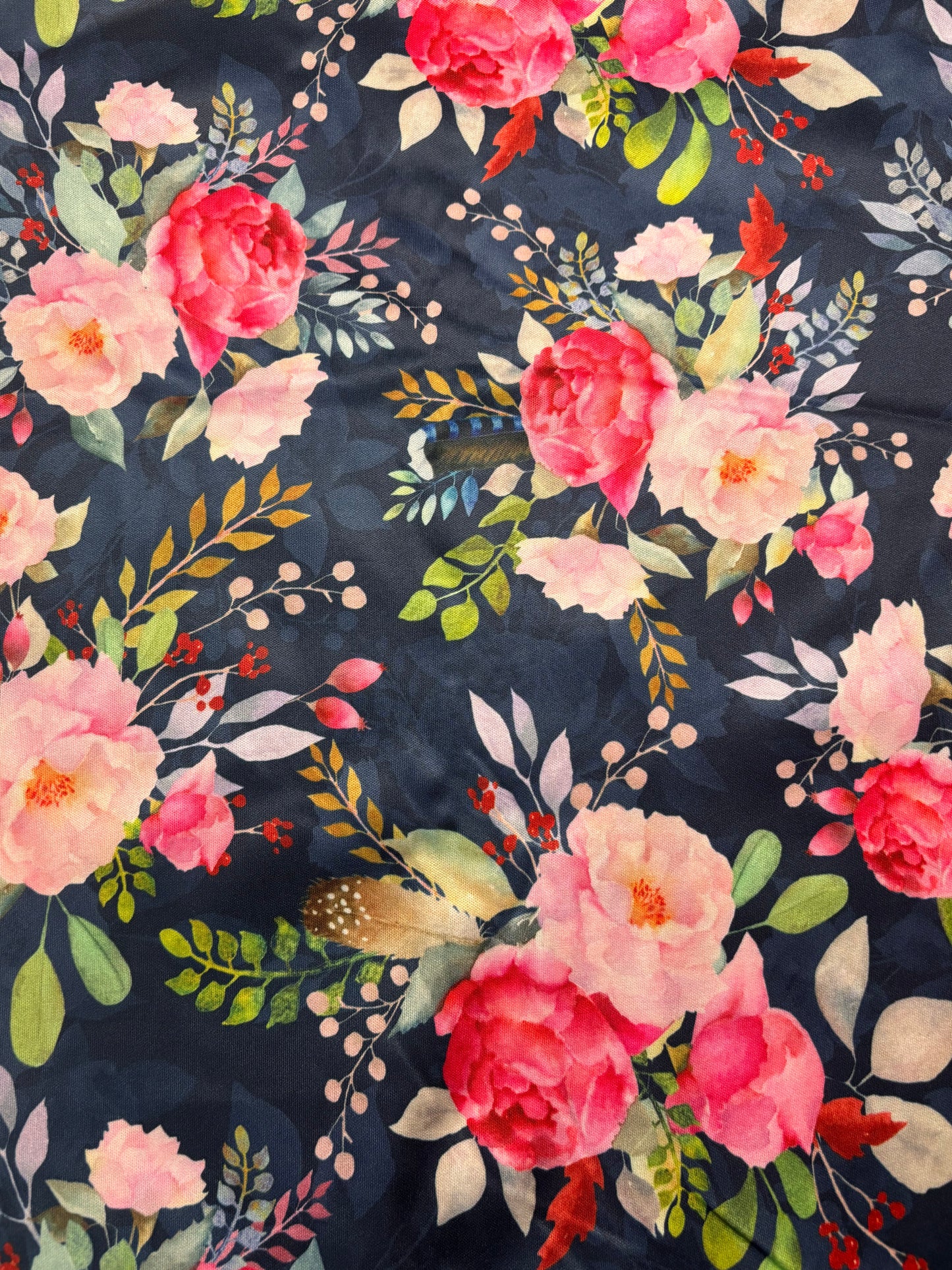 Floral pattern with pink and red flowers on a dark background