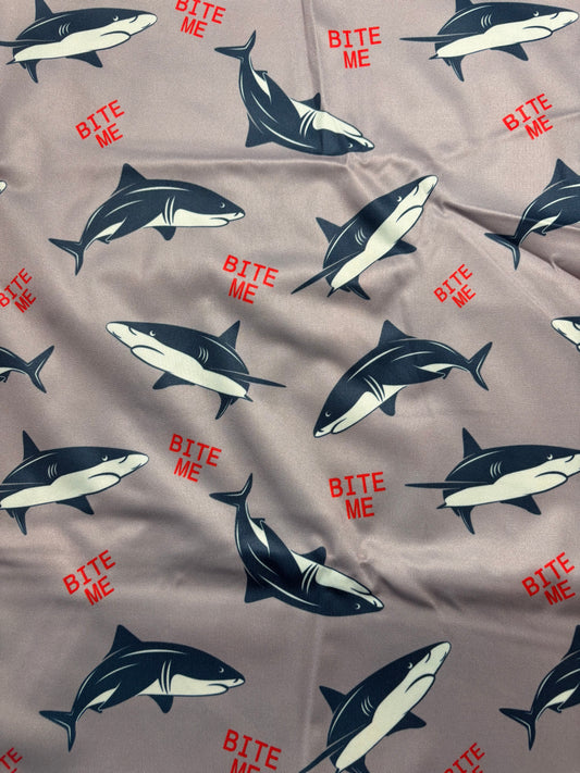 Shark pattern with 'BITE ME' text on a gray background